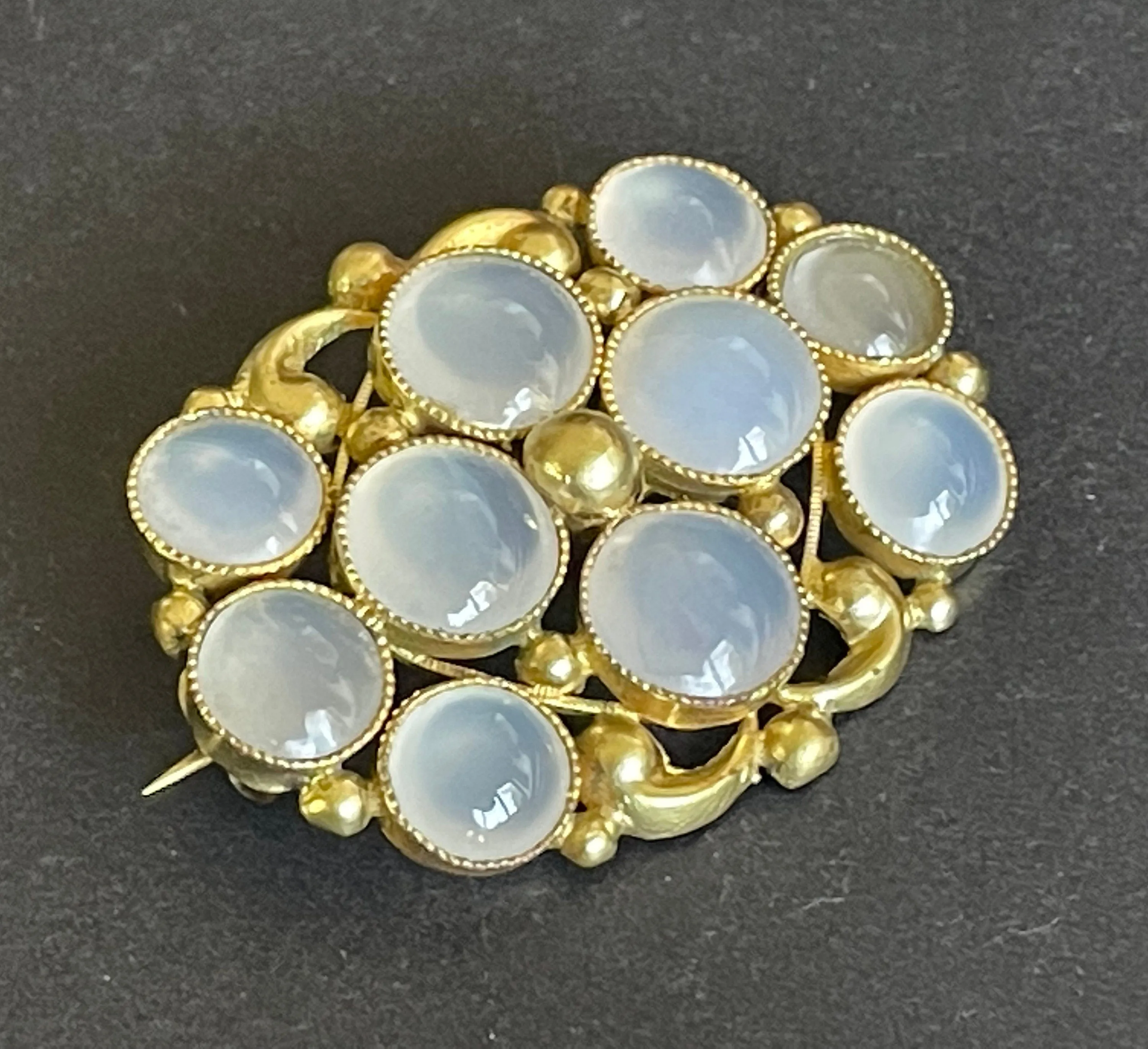 Antique Georgian gold tone yellow metal possibly pinchbeck and natural moonstone cabochon brooch pin, beautiful