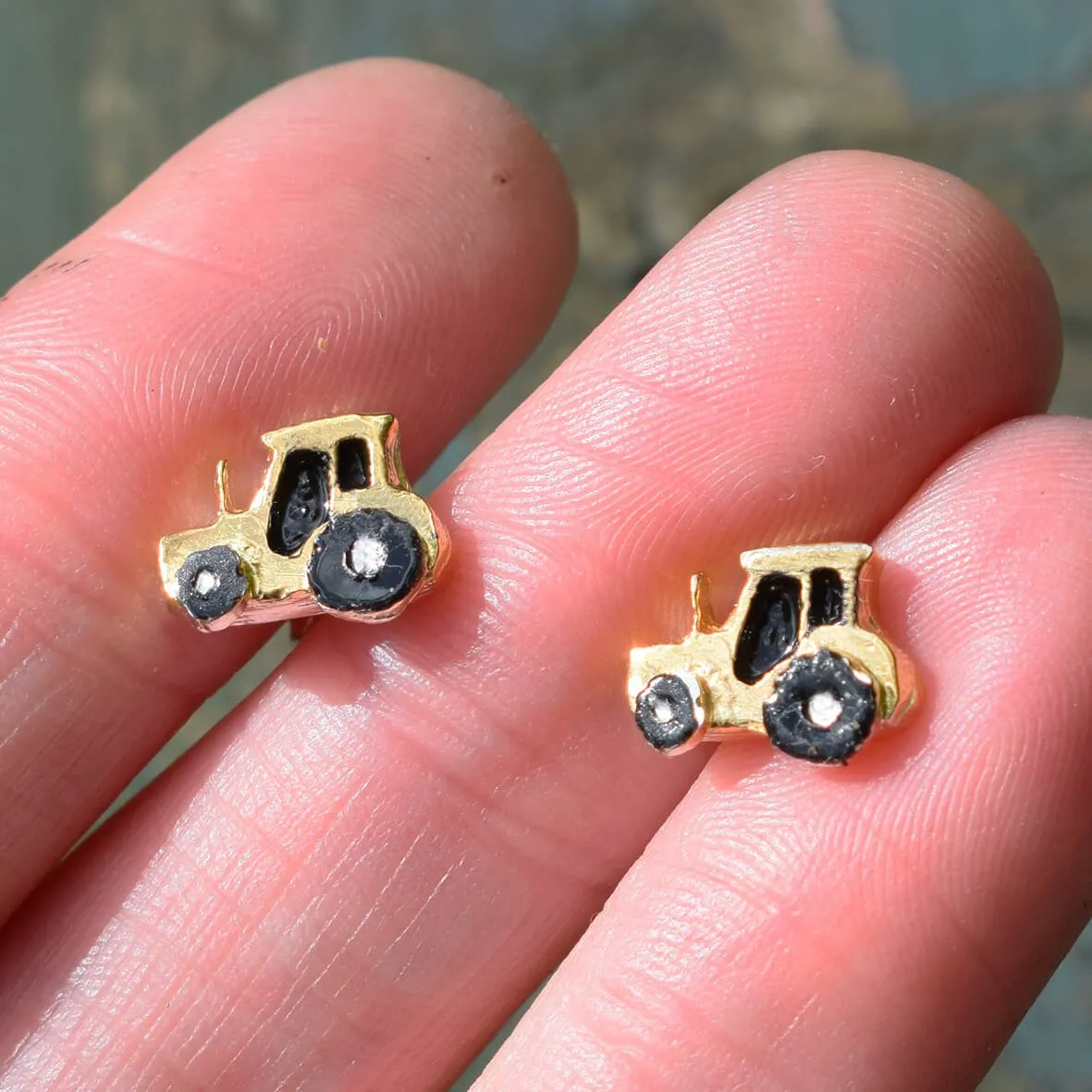 Gold and silver tractor earrings