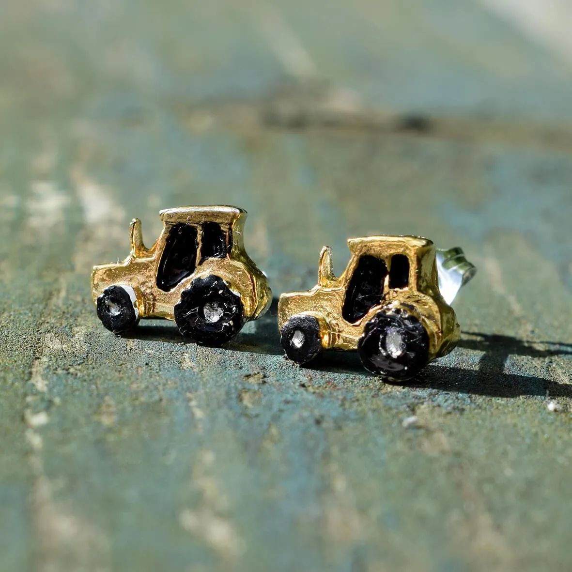 Gold and silver tractor earrings