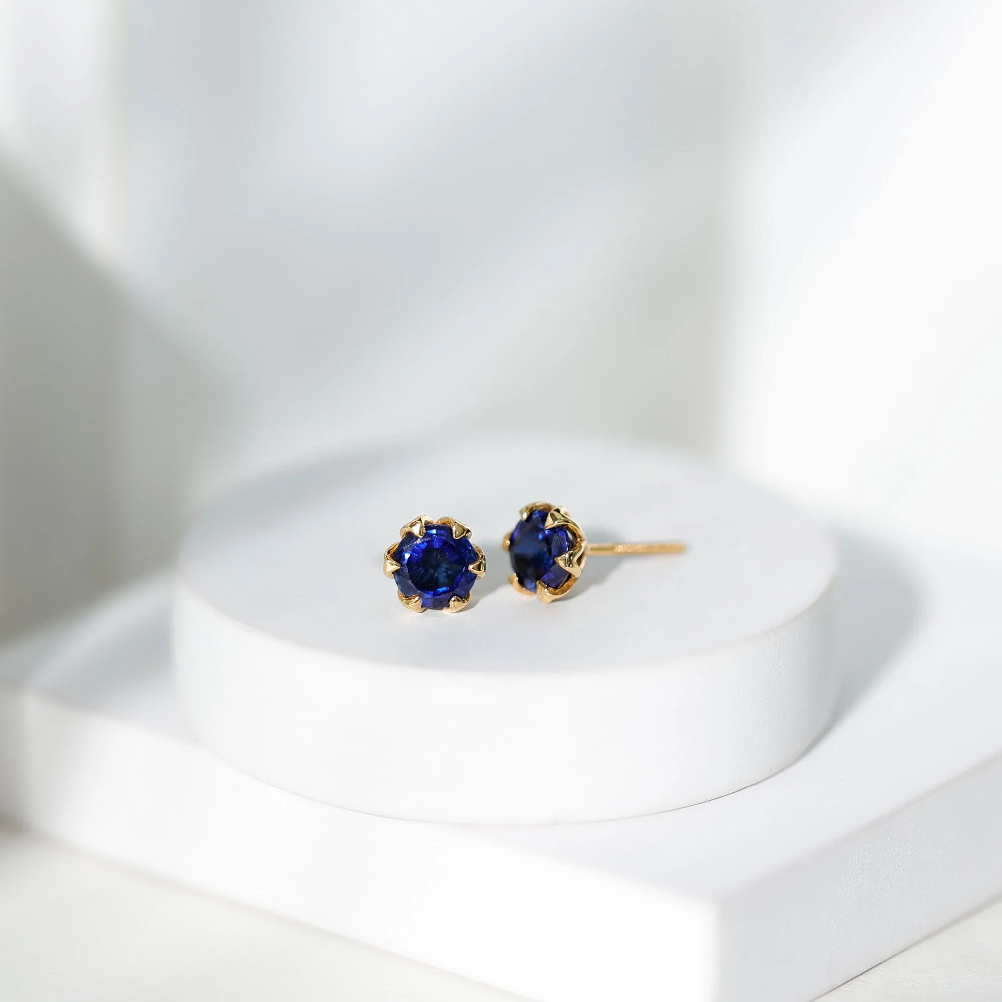 Round Cut Created Blue Sapphire Solitaire Stud Earrings